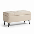 Opbergpoef met stoffen bekleding en zwarte metalen poten 90 x 40 x 40cm